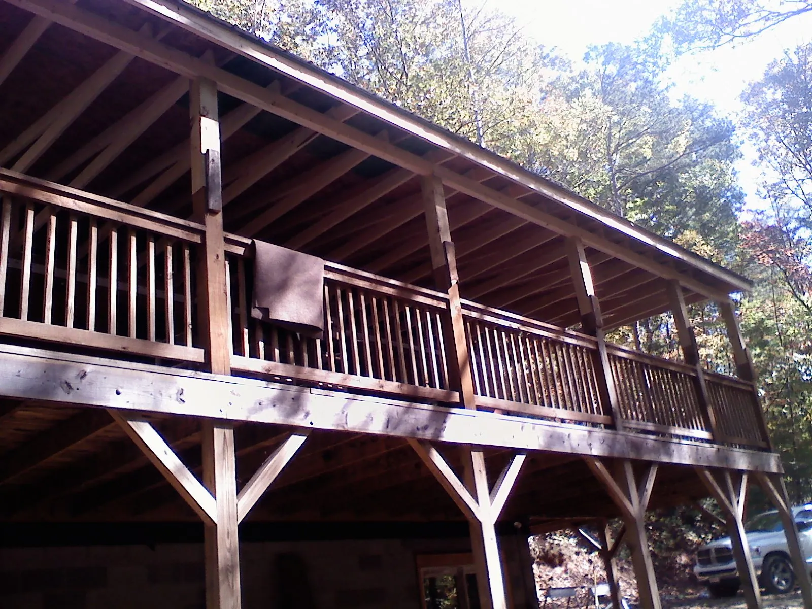 Timber framing under a new elevated porch and deck — Roof Leak Repair in Robins by Roofing Brothers